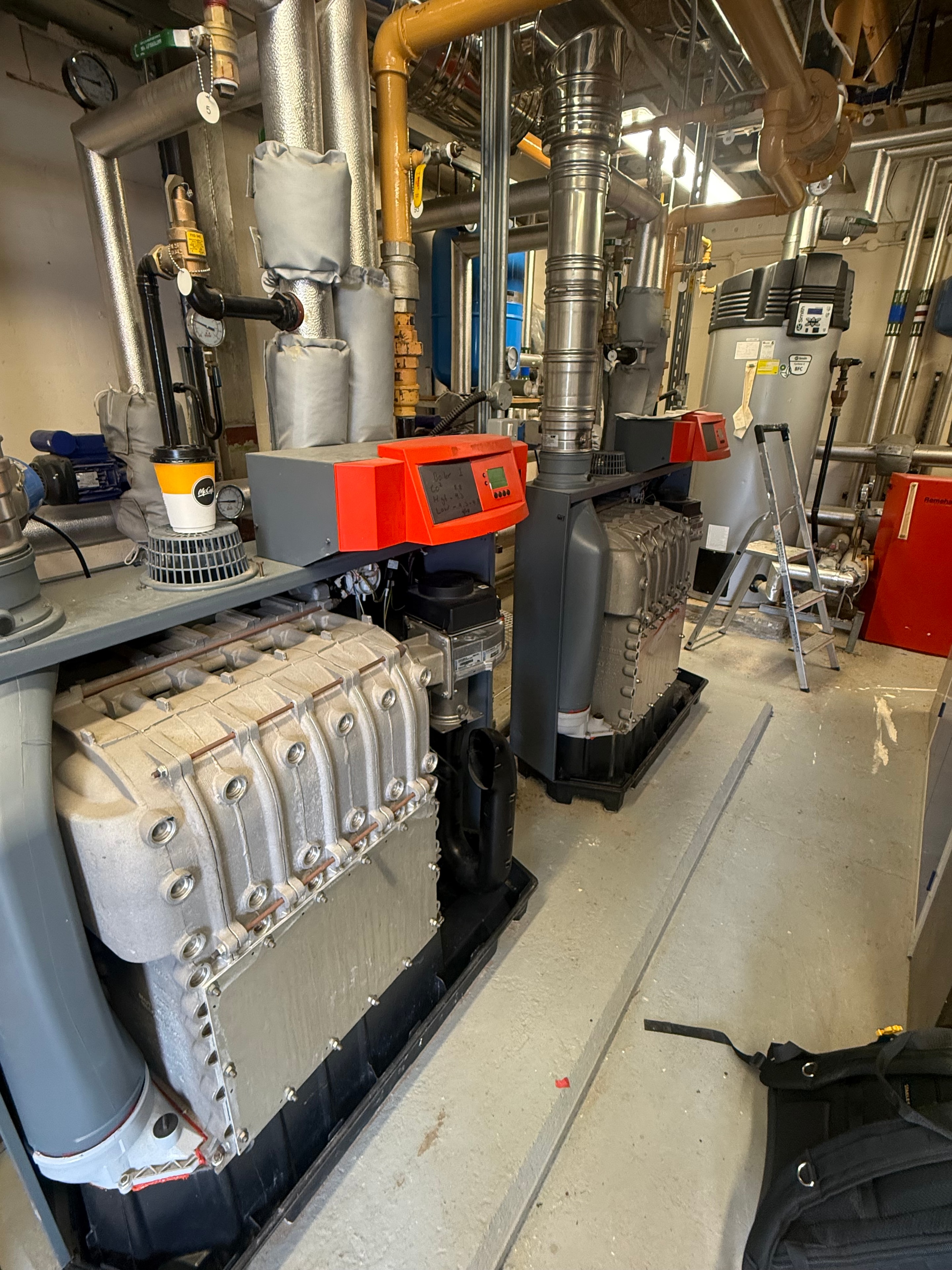 Large commercial plant room with industrial heating equipment