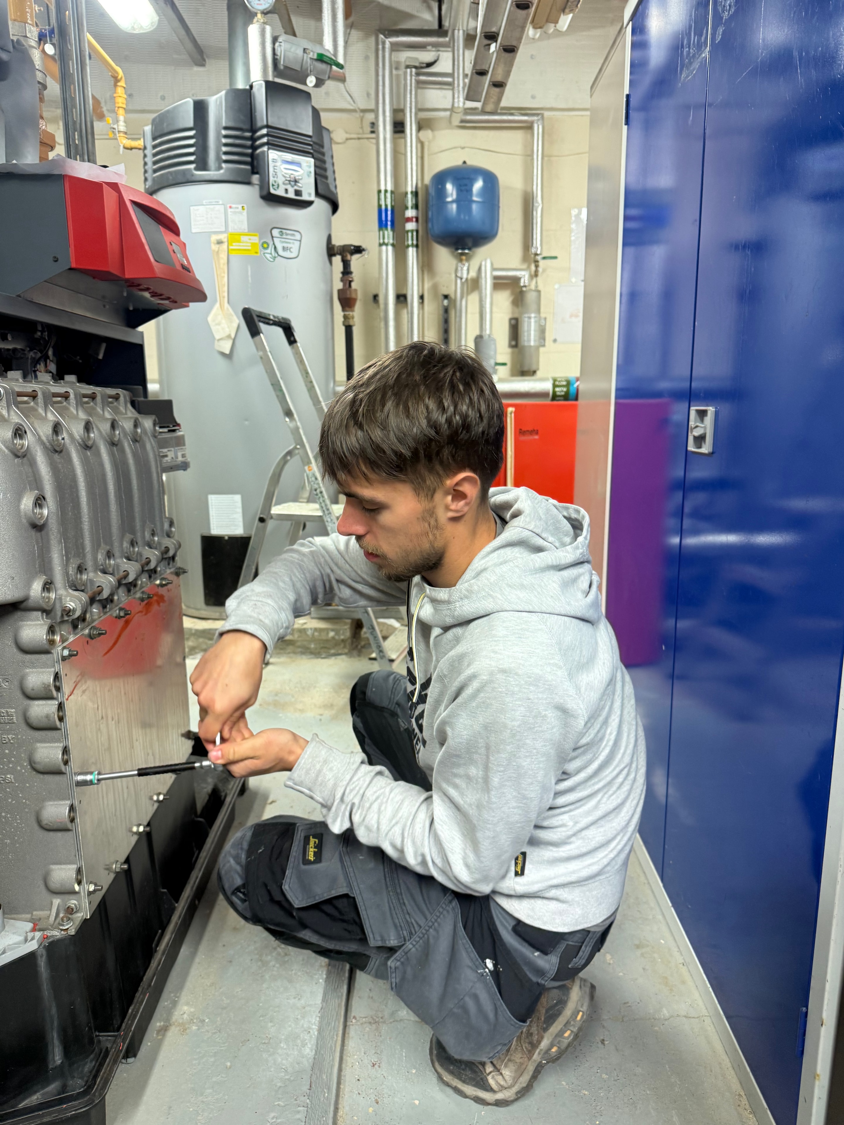 Engineer working on commercial heating system