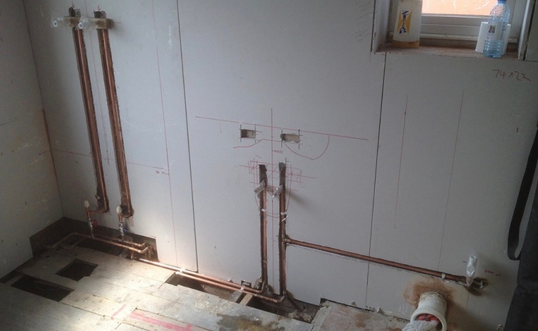 First fix copper pipework roughed in on bathroom walls